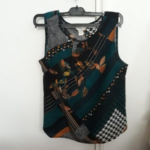 Sleeveless silky tank.               NWOT
